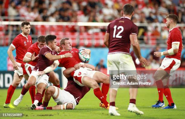 Hadleigh Parkes of Wales is tackled during the Rugby World Cup 2019 Group D game between Wales and Georgia at City of Toyota Stadium on September 23,...