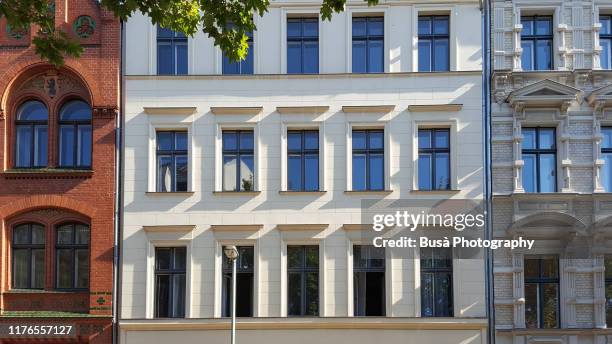 facades of residential building in the center of berlin, germany - berlin wall stockfoto's en -beelden