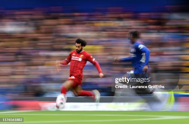 Mohamed Salah of Liverpool runs with the ball during the Premier League match between Chelsea FC and Liverpool FC at Stamford Bridge on September 22,...