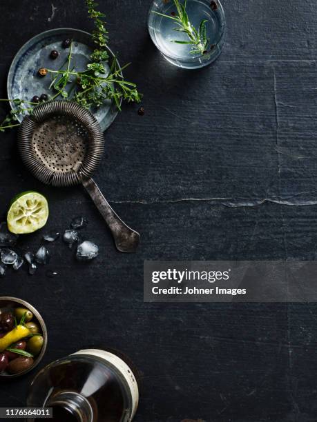 herbs on grey background - wacholderbeeren stock-fotos und bilder