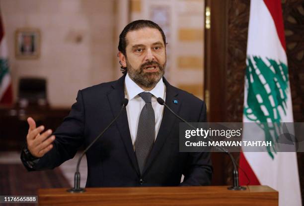 Lebanese Prime Minister Saad Hariri gives an address at the government headquarters in the centre of the capital Beirut on October 18, 2019. Hariri...