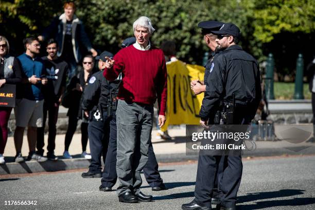 Actor Sam Waterston is arrested by U.S. Capitol Police along with Jane Fonda and other climate activists after blocking 1st Street in front of the...