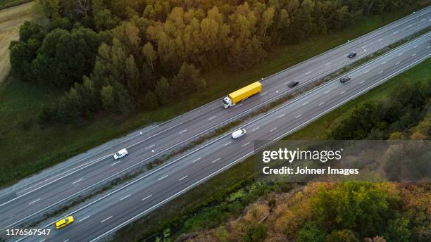 cars on highway, aerial view - truck birds eye stockfoto's en -beelden