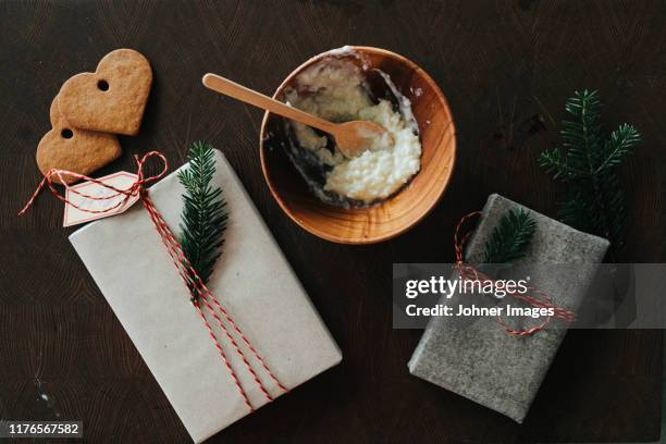 christmas gifts and bowl with porridge - 茶粥 ストックフォトと画像