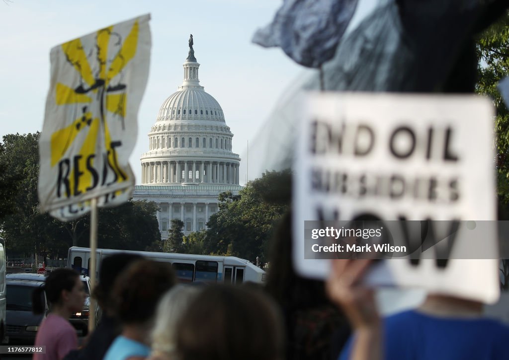 Environmental Activists Hold Protest Shutting Down Roads In Nation's Capital