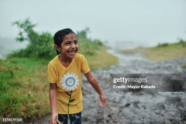 girl enjoying rain - girl wet stock pictures, royalty-free photos & images