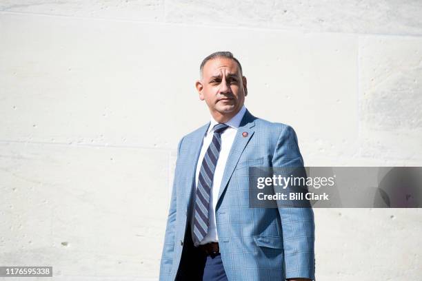 Rep. Gil Cisneros, D-Calif., walks down the House steps following the last votes of the week in the Capitol on Friday, Oct. 18, 2019.