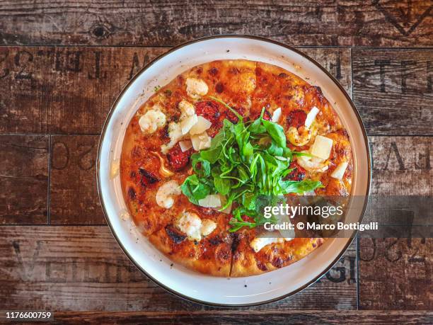 directly above view of langoustine pizza, iceland - scampi stock pictures, royalty-free photos & images