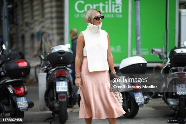 Aylin Koenig poses outside the Sportmax show during Milan Fashion Week Spring/Summer 2020 on September 20, 2019 in Milan, Italy.