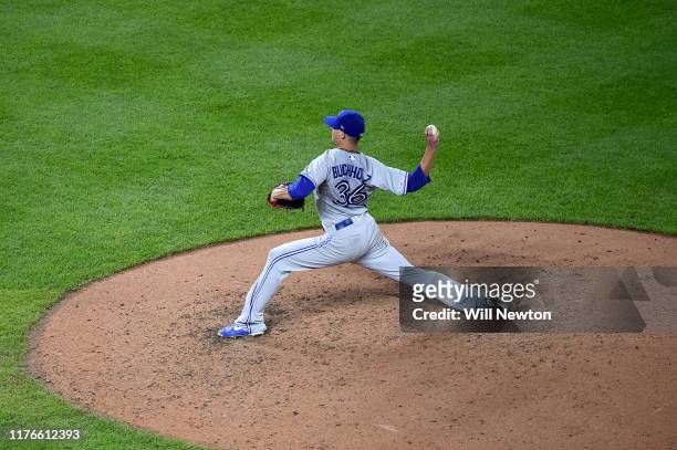 Clay Buchholz of the Toronto Blue Jays pitches during the game against the Baltimore Orioles at Oriole Park at Camden Yards on September 18, 2019 in...