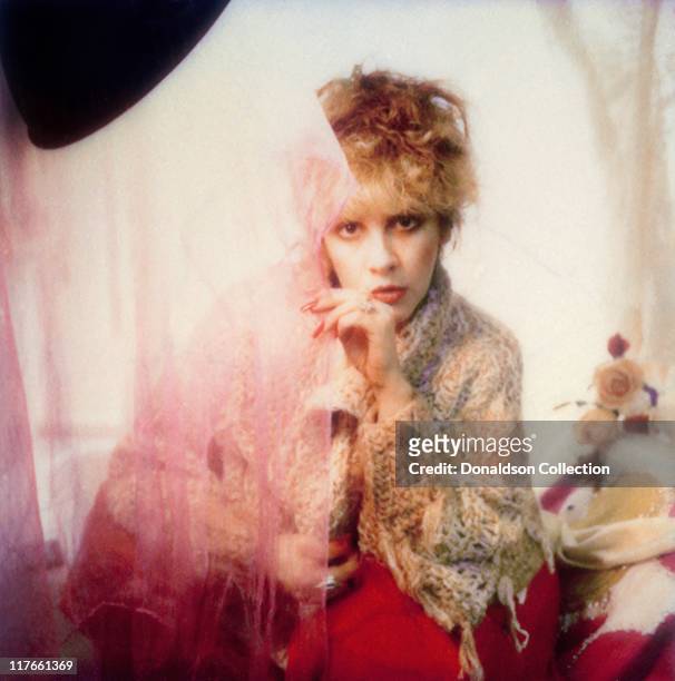 Singer Stevie Nicks poses for a photo backstage in 1985 in Los Angeles, California.