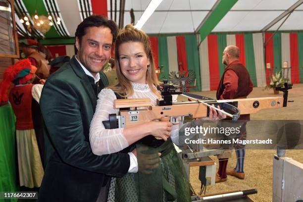 Roman Libbertz and his wife Jessica Libbertz during the BMW Armbrustschiessen as part of the Oktoberfest 2019 at Armbrust-Schuetzenfesthalle at...