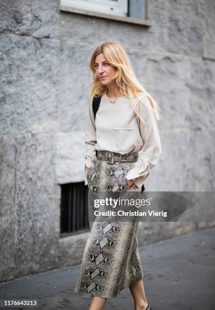 Ada Kokosar is seen wearing skirt with snake print outside the Missoni show during Milan Fashion Week Spring/Summer 2020 on September 21, 2019 in...