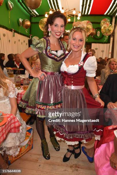 Lola Paltinger and Eva Grünbauer during the BMW Armbrustschiessen as part of the Oktoberfest 2019 at Armbrust-Schuetzenfesthalle at Theresienwiese on...