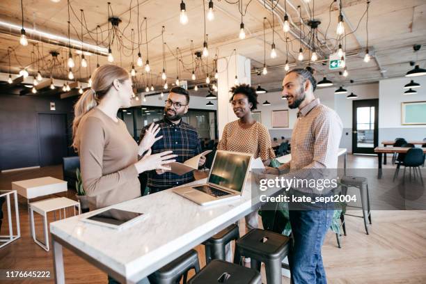 software engineers working on project and programming in company - retail manager stock pictures, royalty-free photos & images