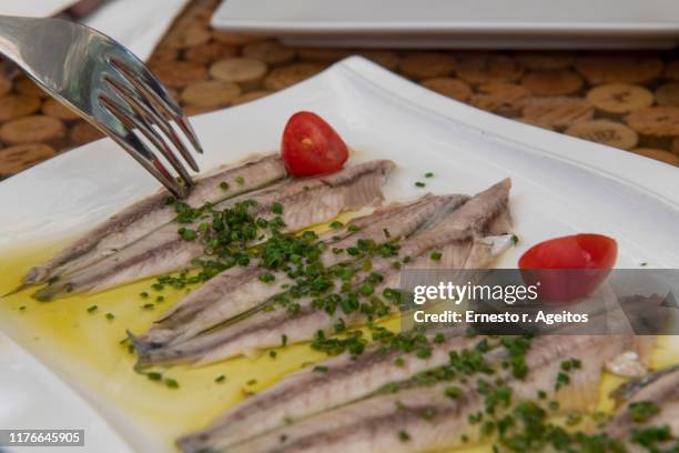 boquerones en vinagre (fresh anchovies in vinegar). spanish tapa - anchoa fotografías e imágenes de stock
