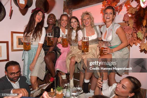 Johanna Klum, Nikeata Thompson, Marina Hörmanseder, Cathy Hummels and Lea-Sophie Cramer during the Oktoberfest 2019 at Theresienwiese on September...