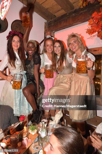 Johanna Klum, Nikeata Thompson, Marina Hörmanseder, Cathy Hummels and Lea-Sophie Cramer during the Oktoberfest 2019 at Theresienwiese on September...