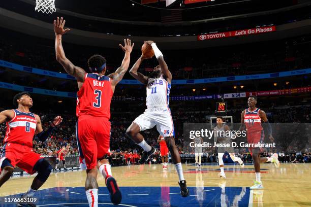 James Ennis III of the Philadelphia 76ers shoots the ball against the Washington Wizards during a pre-season game on October 18, 2019 at the Wells...