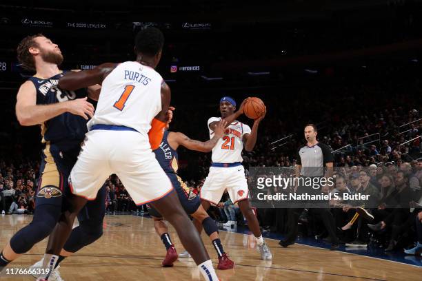Damyean Dotson of the New York Knicks handles the ball against the New Orleans Pelicans during a pre-season game on October 18, 2019 at Madison...