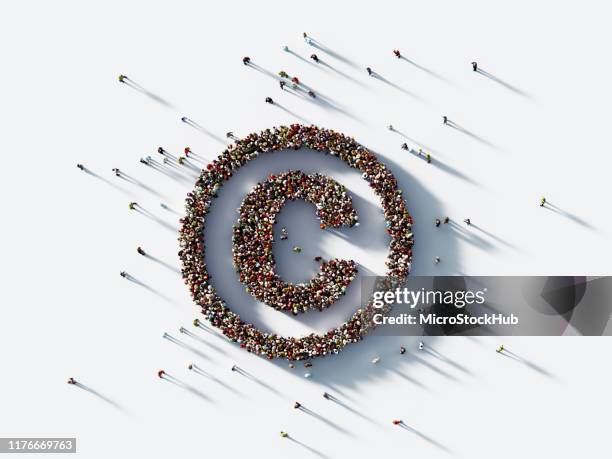 human crowd forming copyright symbol on white background : patent and copyright concept - creative crowd imagens e fotografias de stock