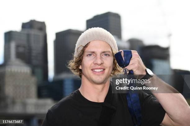 Fremantle Dockers AFL player Nat Fyfe poses with his medal after winning last night's 2019 Brownlow Medal, at Crown Riverwalk on September 24, 2019...