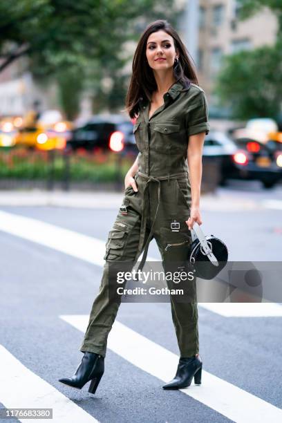 Victoria Justice is seen wearing The Kooples jumpsuit with Sam Edelman boots and Rebecca Minkoff handbag in Murray Hill on September 23, 2019 in New...