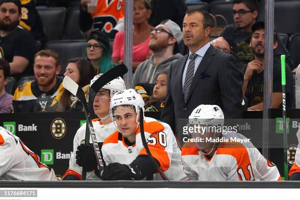 Philadelphia Flyers head coach Alain Vigneault looks on during the second period of the preseason game between the Philadelphia Flyers and the Boston...