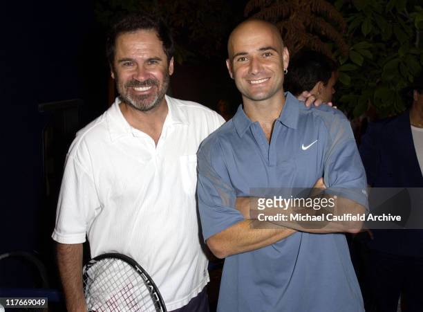 Dennis Miller and Andre Agassi during 2002 Mercedes-Benz Cup - "A Night at the Net" - Backstage at Los Angeles Tennis Center, UCLA in Los Angeles,...
