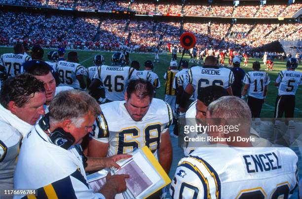 Joe Cocozzo, C Greg Engel and other players conversing with Offensive Line Coach Carl Mauck. San Francisco 49ers 17 vs San Diego Chargers 6 at Jack...