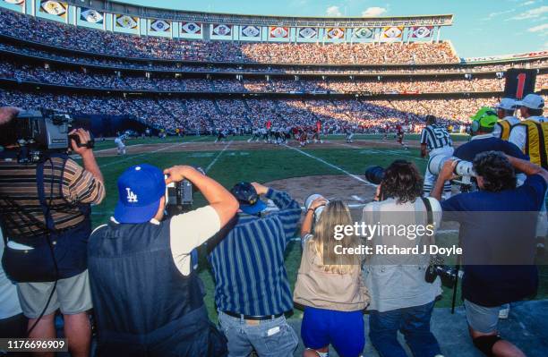 Game Day - Media - Sports Photographers line the sideline shooting the game. San Francisco 49ers 17 vs San Diego Chargers 6 at Jack Murphy Stadium in...