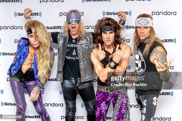 Lexxi Foxx, Michael Starr, Satchel and Stix Zadinia of Steel Panther visit and perform at SiriusXM Studios on September 23, 2019 in New York City.