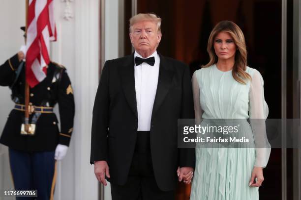 President Donald Trump and First Lady Melania Trump wait for the arrival of Australian Prime Minister Scott Morrison and his wife, Jenny Morrison,...