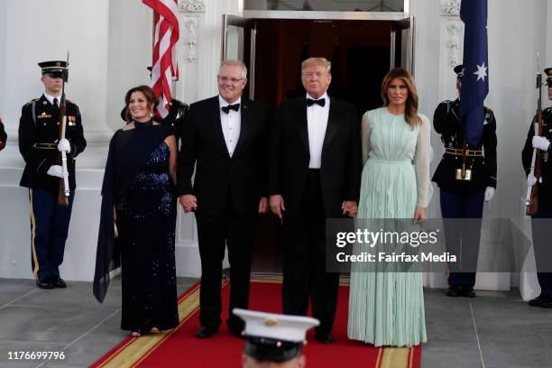 President Donald Trump and First Lady Melania Trump greet Australian Prime Minister Scott Morrison and his wife, Jenny Morrison, ahead of a state...