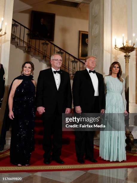 President Donald Trump and First Lady Melania Trump pose for photos with Australian Prime Minister Scott Morrison and his wife, Jenny Morrison, ahead...