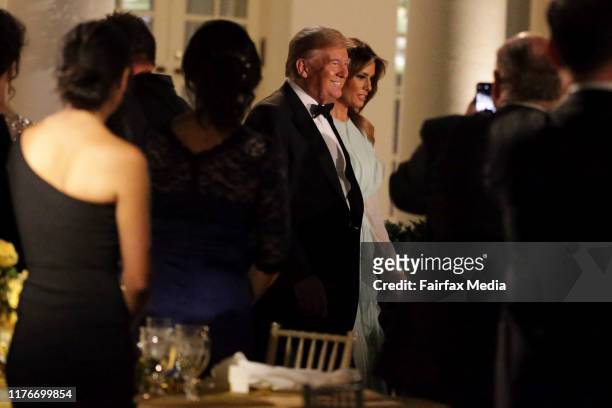 President Donald Trump and First Lady Melania Trump arrive at a state dinner with the Australian Prime Minister Scott Morrison and his wife, Jenny...