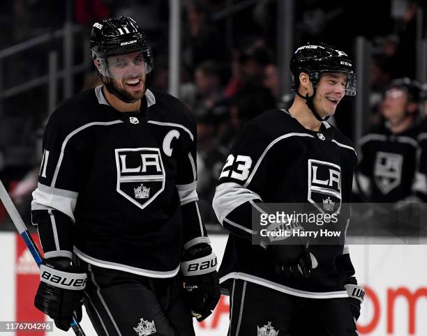 Anze Kopitar of the Los Angeles Kings celebrates his empty net goal with Dustin Brown during the third period in a 3-0 Kings preseason win over the...
