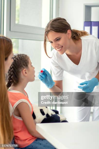 doctor testing biological specimen - staphylococcus stock pictures, royalty-free photos & images