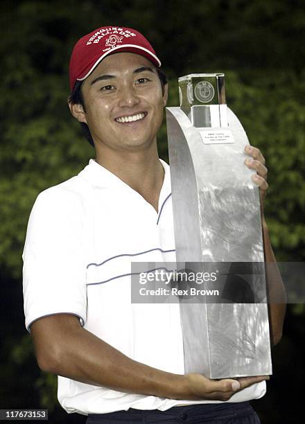 Ryuji Imada holds up his trophy after winning the BMW Pro-AM May 2 at The Cliffs, in Travelers Rest, South Carolina.