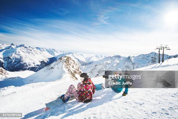 snowboarding in austria - snowboarding stock pictures, royalty-free photos & images