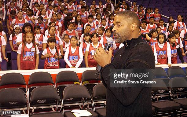 Former NBA great Norm Nixon adresses students from Miles Elementary.