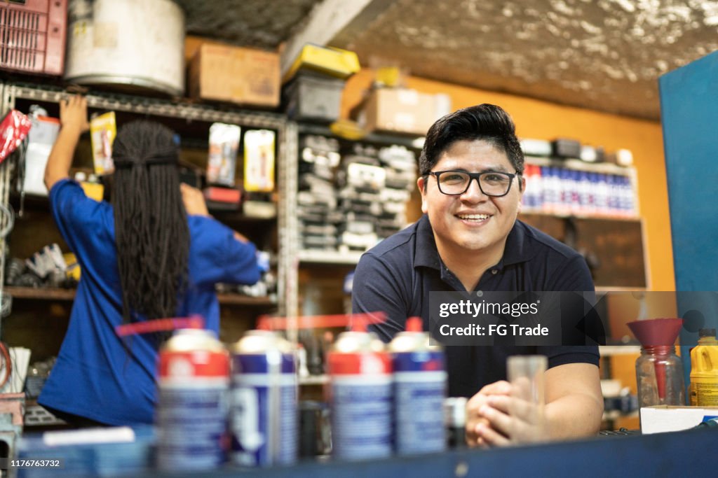 Portrait of a mechanic working in a auto repair shop