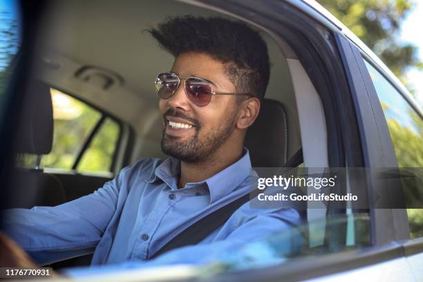 man driving a car - man sunglasses stock pictures, royalty-free photos & images