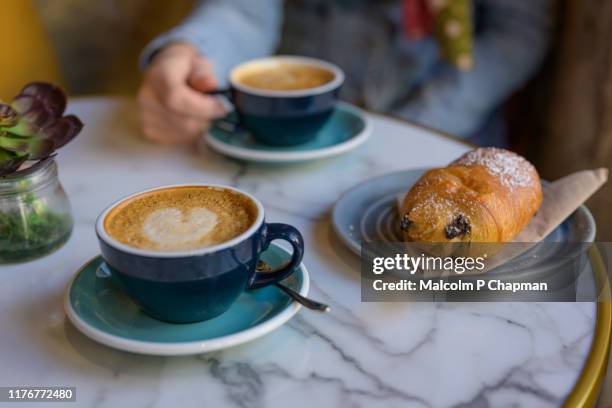 coffee and pain au chocolat - sweet pastry and coffee for breakfast - pain au chocolat stock pictures, royalty-free photos & images