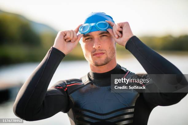 focused to swim - wetsuit stock pictures, royalty-free photos & images