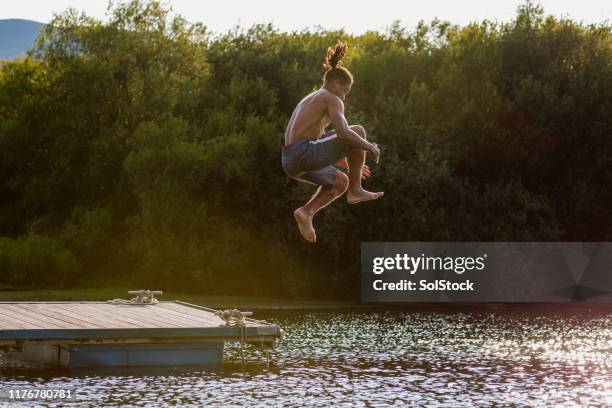 cannonball - cannonball diving stock pictures, royalty-free photos & images