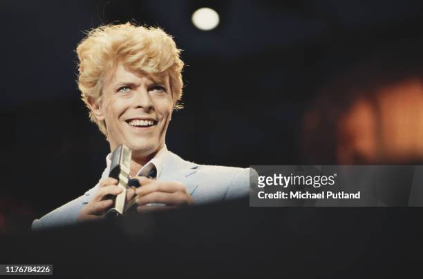 English singer and musician David Bowie performs live on stage during the first night of his Serious Moonlight World Tour at the Vorst Forest...