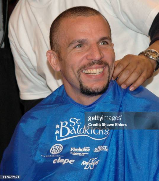 Jason Kidd during Jason Kidd Shaves Lucky Fan's Head to Help Raise Money for Childhood Cancer Research at NBA Store in New York City, New York,...