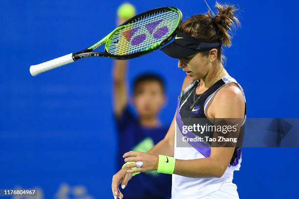 Belinda Bencic of Switzerland reacts during the match against Veronika Kudermetova of Russia on Day 3 of 2019 Dongfeng Motor Wuhan Open at Optics...