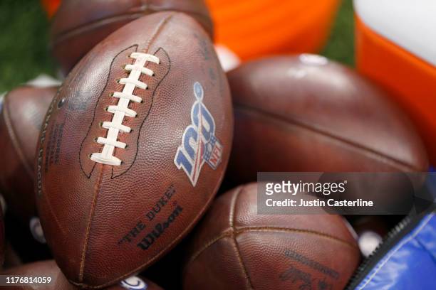 An NFL football with the 100 logo in the game between the Atlanta Falcons and the Indianapolis Colts at Lucas Oil Stadium on September 22, 2019 in...